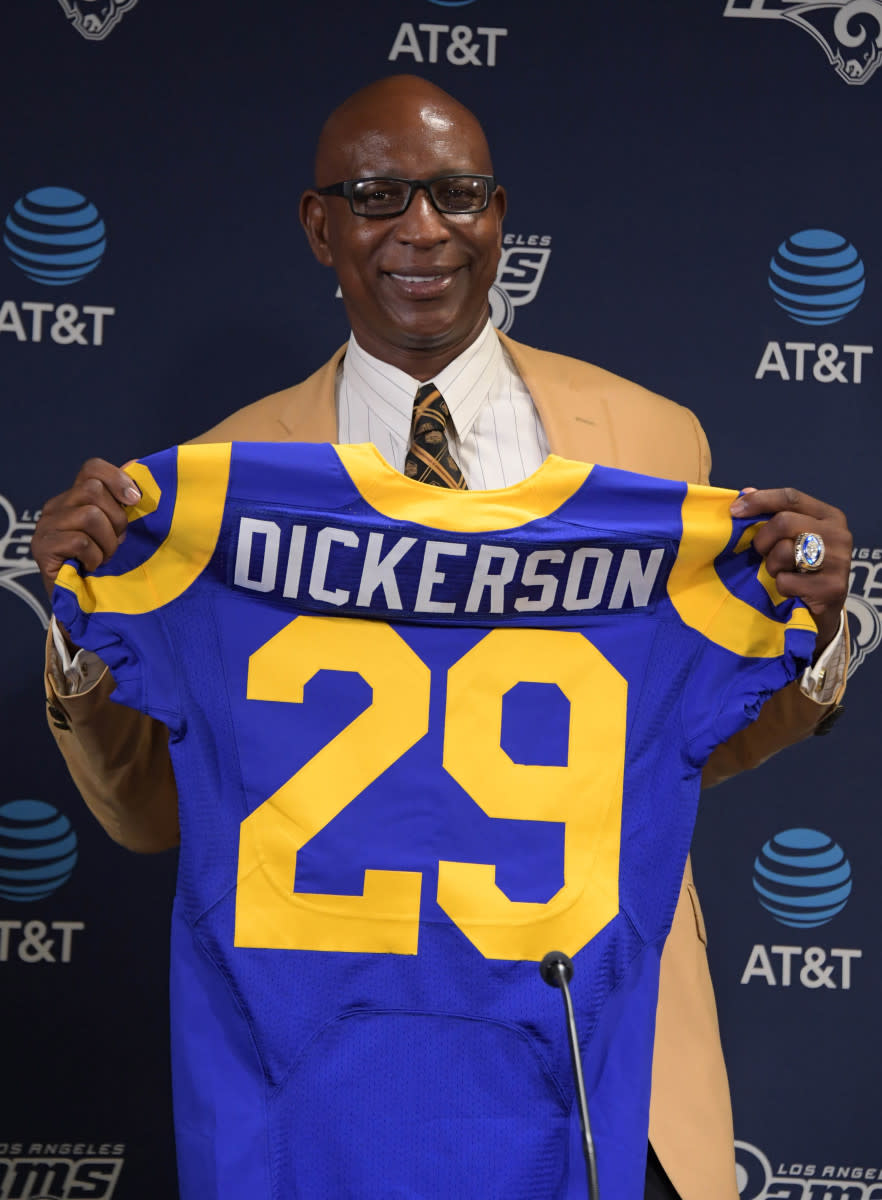 Former Rams running back Eric Dickerson poses with No. 29 jersey during a press conference after signing a one-day contract to retire as a member of the Rams at Cal Lutheran University on August 29, 2017.